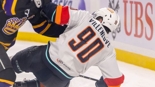 Coachella Valley Firebirds Nathan Villeneuve (90) battles for the puck during an AHL hockey game against the Ontario Reign, Sunday, October 11, 2026, in Palm Desert, Calif.