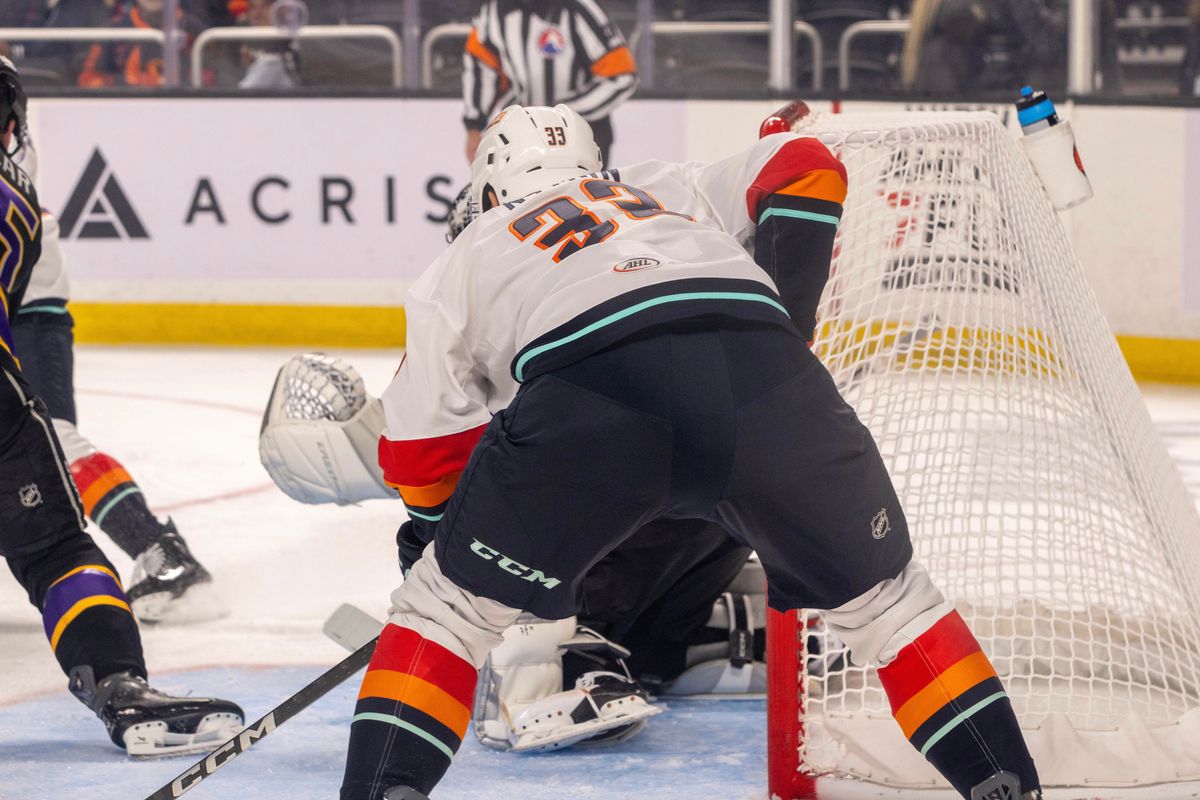 Coachella Valley Firebirds player (33) battles for position near the net during an AHL hockey game against the Ontario Reign, Sunday, October 11, 2026, in Palm Desert, Calif.