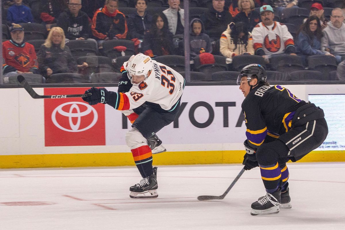 Coachella Valley Firebirds forward Jani Nyman (33) takes a shot during an AHL hockey game against the Ontario Reign, Sunday, October 11, 2026, in Palm Desert, Calif.