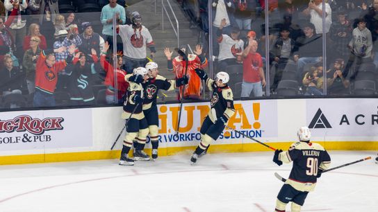 Coachella Valley Firebirds forward Jagger Firkus (57) celebrates his goal with teammates during the first period of an AHL hockey game against the Henderson Silver Knights at Acrisure Arena, Friday, Oct. 30, 2026, in Palm Desert, Calif.  8