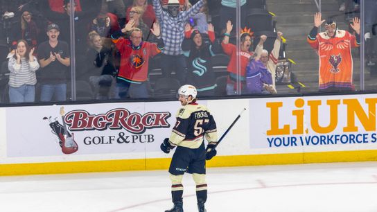 Coachella Valley Firebirds forward Jagger Firkus (57) celebrates as fans cheer during the first period of an AHL hockey game against the Henderson Silver Knights at Acrisure Arena, Friday, Oct. 30, 2026, in Palm Desert, Calif.