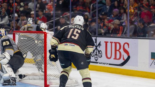 Coachella Valley Firebirds forward John Hayden (15) watches play near the Henderson Silver Knights’ net during the third period of an AHL hockey game at Acrisure Arena, Friday, Oct. 30, 2026, in Palm Desert, Calif.