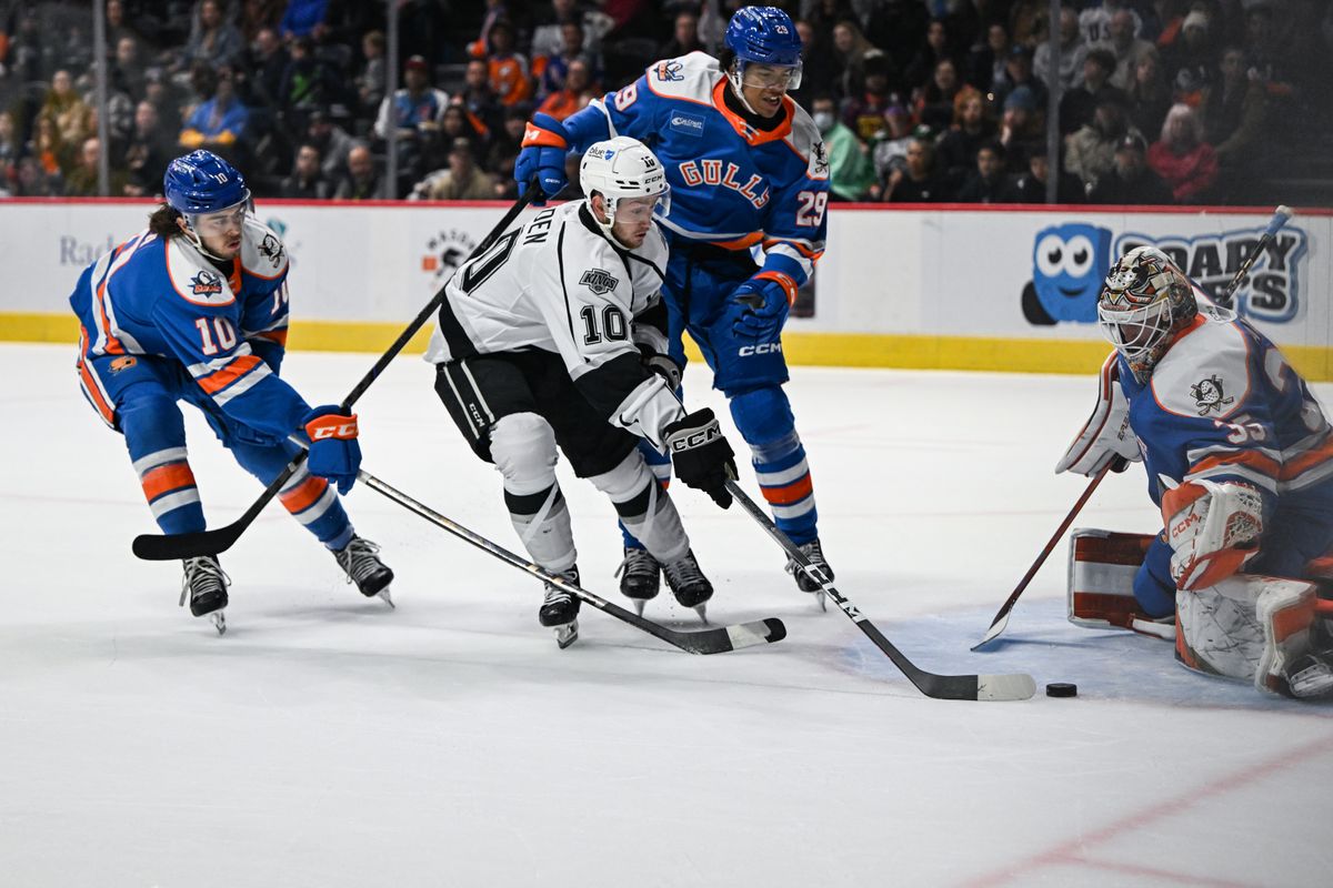 Ontario Reign forward Tyler Madden (10) takes a shot against San Diego Gulls goalie Oscar Dansk (35) during an AHL hockey game, Friday, December 27, 2024 in San Diego, Calif.
