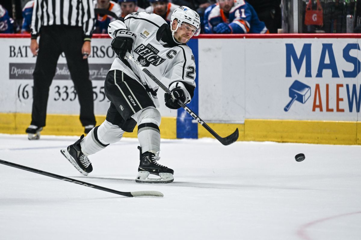Ontario Reign defenseman Joe Hicketts (27) takes a slapshot during an AHL hockey game against the San Diego Gulls, Friday, December 27, 2024 in San Diego, Calif.