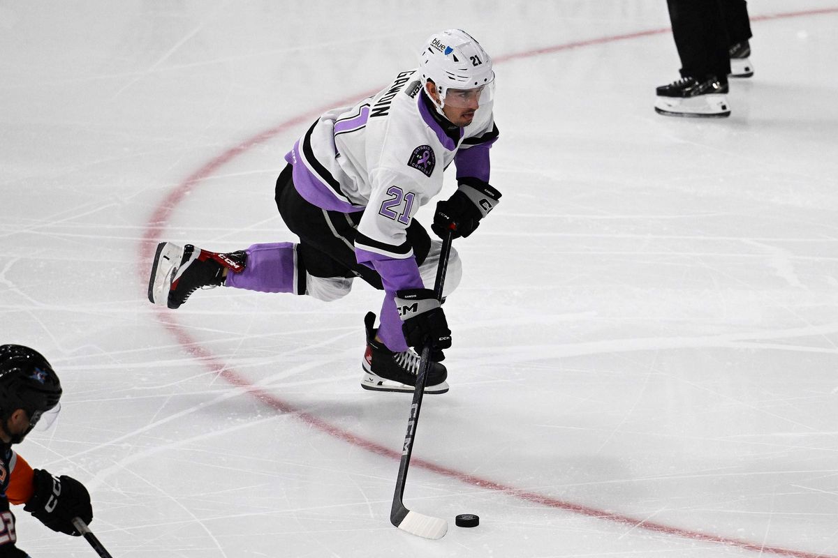 Ontario Reign Forward Glenn Gawdin (21) gains possession during an AHL hockey game against the San Diego Gulls, Saturday November 8th 2025 in Ontario, Calif.