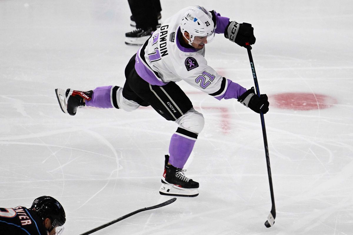 Ontario Reign Forward Glenn Gawdin (21) shoots a goal attempt during an AHL hockey game against the San Diego Gulls, Saturday November 8th 2025 in Ontario, Calif.