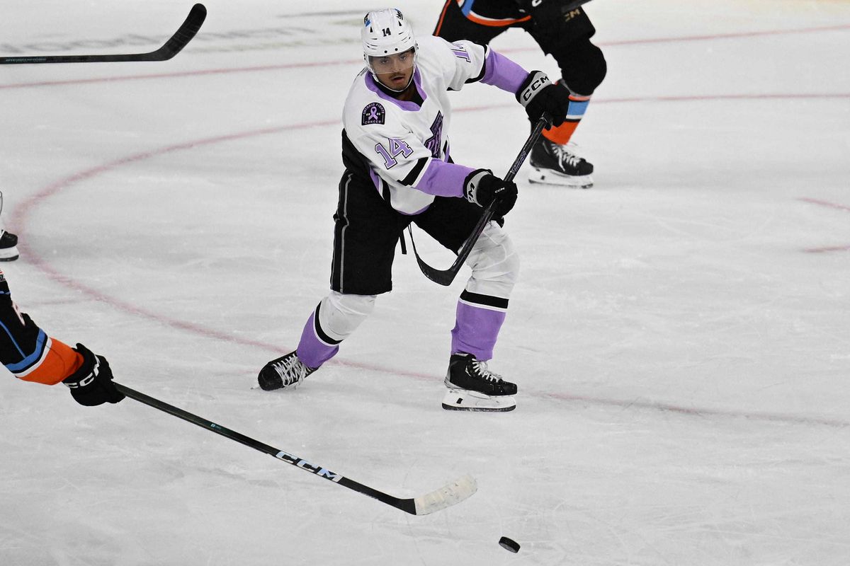 Ontario Reign forward Akil Thomas (14) gains possession during an AHL hockey game against the San Diego Gulls, Saturday November 8th, 2025 in Ontario, Calif.