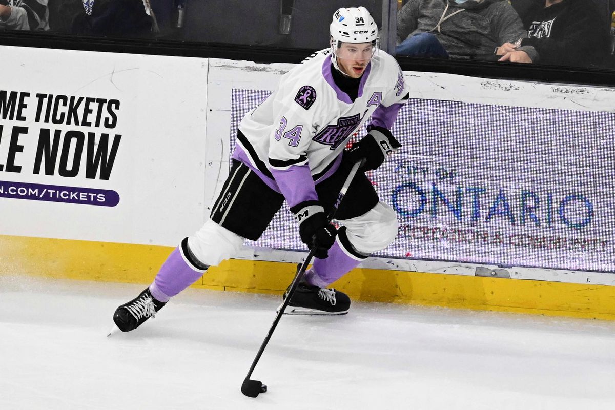 Ontario Reign forward Taylor Ward (34) gains possession during an AHL hockey game against the San Diego Gulls, Saturday November 8th, 2025 in Ontario, Calif.