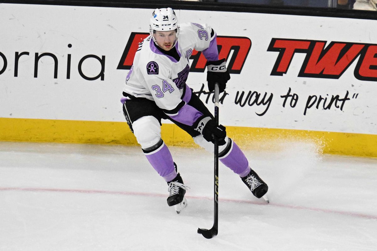 Ontario Reign forward Taylor Ward (34) gains possession during an AHL hockey game against the San Diego Gulls, Saturday November 8th, 2025 in Ontario, Calif.