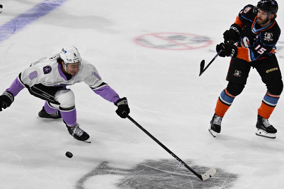 Ontario Reign forward Martin Chromiak (8) fights for possession during an AHL hockey game against the San Diego Gulls, Saturday November 8th, 2025 in Ontario, Calif.
