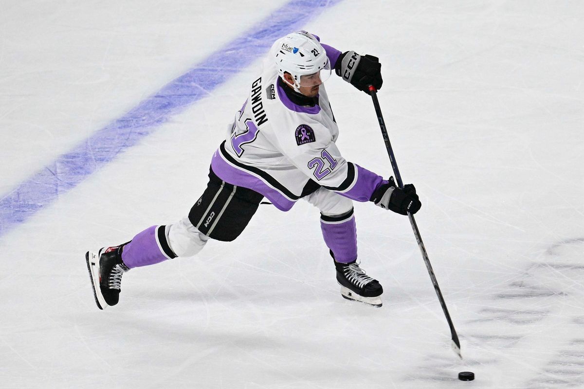 Ontario Reign forward Glenn Gawdin (21) passes during an AHL hockey game against the San Diego Gulls, Saturday November 8th, 2025 in Ontario, Calif.