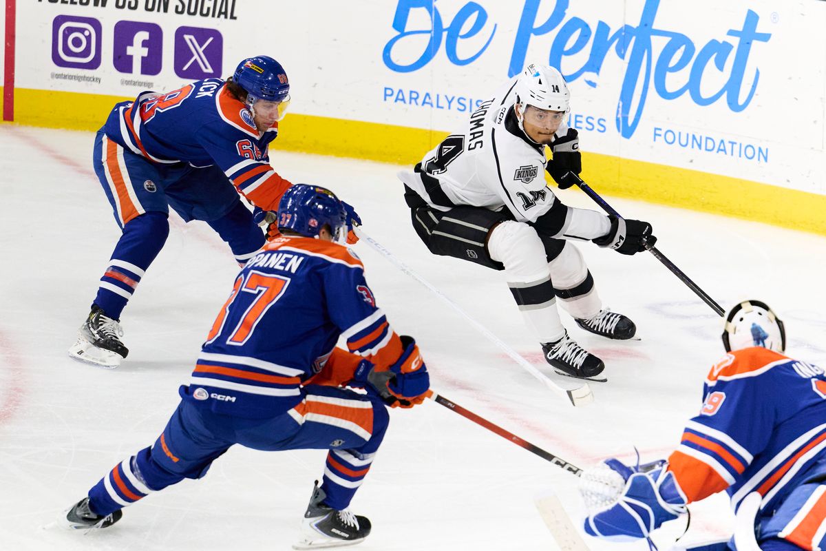 Ontario reign forward Akil Thomas (14) looks for a shot during an AHL hockey game against the Bakersfield Condors, Friday November 21, 2025 in Ontario, Calif.