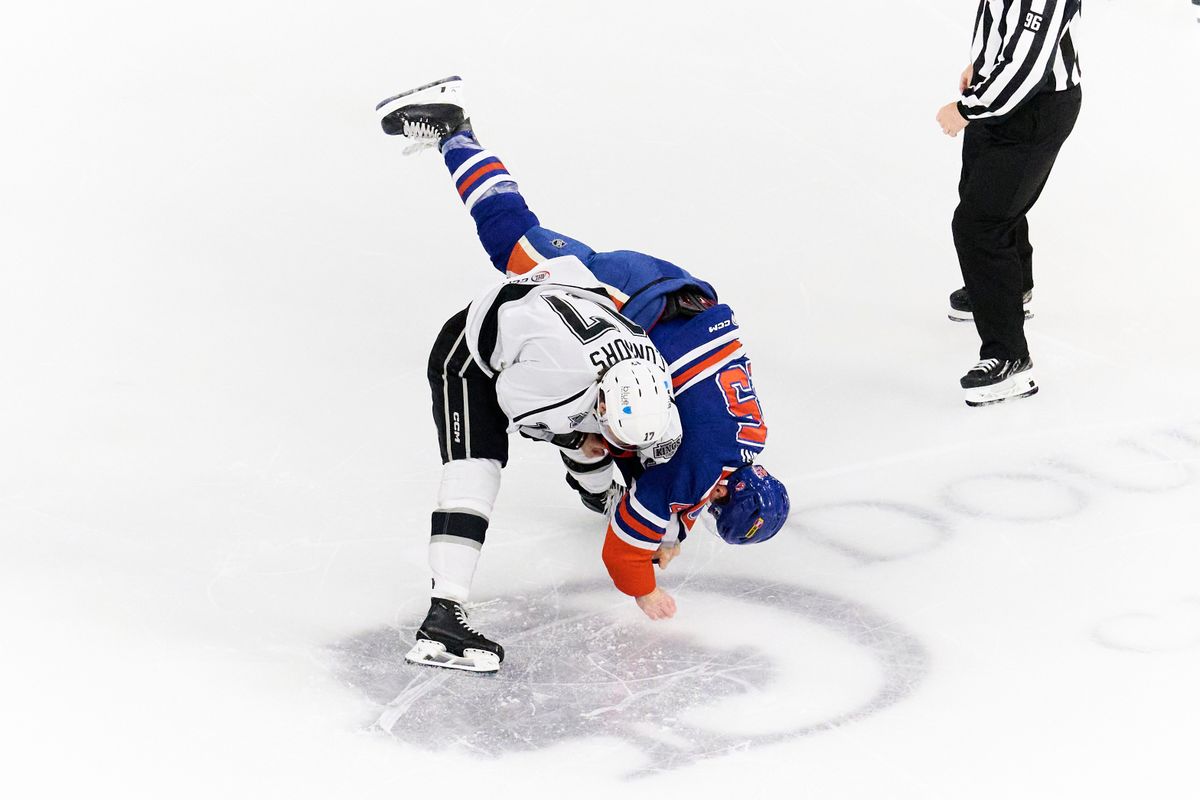 Ontario reign forward Kenny Connors (17) does a take down during an AHL hockey game against the Bakersfield Condors, Friday November 21, 2025 in Ontario, Calif.