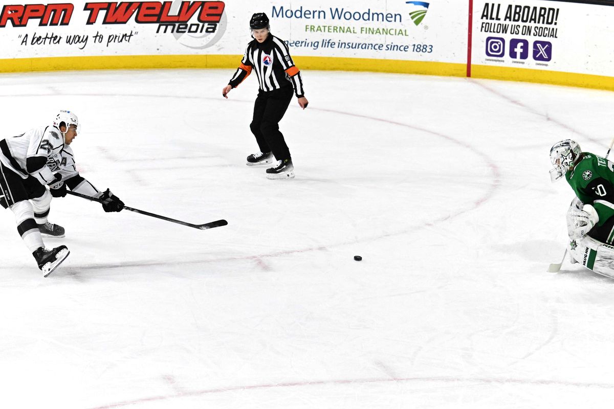 Ontario Reign forward Andre Lee (26) shoots for a goal attempt  during an AHL hockey game agains’t the Texas Stars, Tuesday December 9th, 2025 in Ontario, Calif.