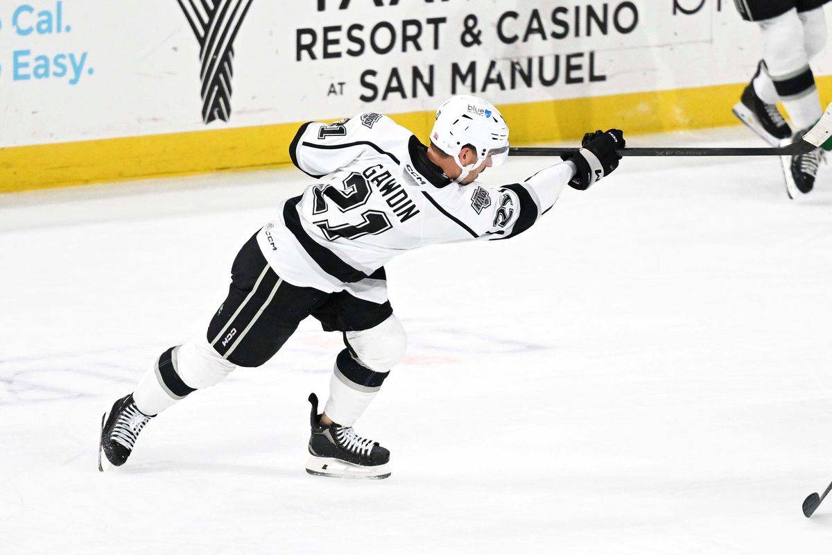 Ontario Reign forward Glenn Gawdin (21) shoot’s a slap shot during an AHL hockey game agains’t the Texas Stars, Tuesday December 9th, 2025 in Ontario, Calif.