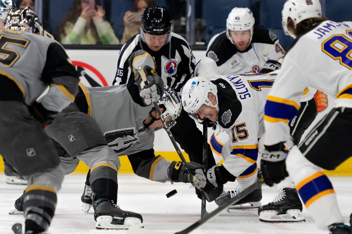 Ontario Reign center Grant Slukynsky (15) takes a face off during an AHL game against the Henderson Silver Knights, Saturday, Oct. 17, 2026, in Ontario, California. Ontario Reign center Grant Slukynsky (15) takes a face off during an AHL game against the Henderson Silver Knights, Saturday, Oct. 17, 2026, in Ontario, California.