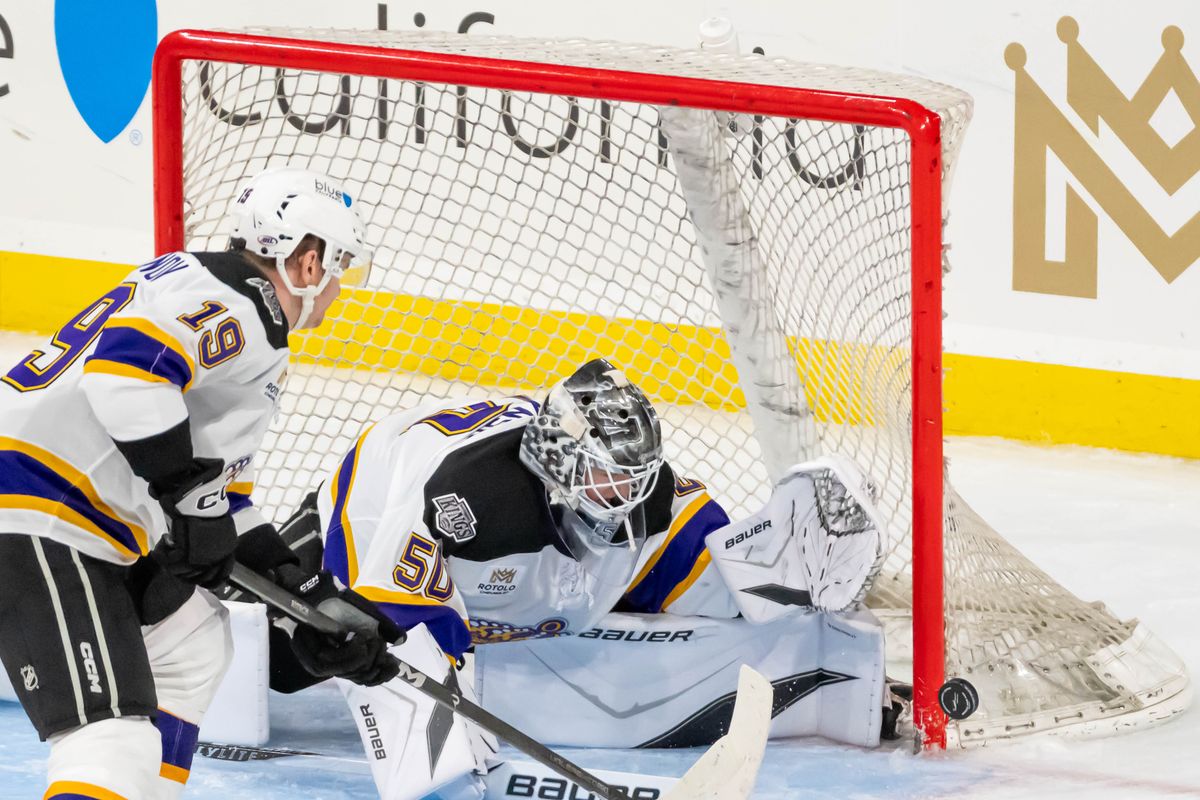 Ontario Reign goalie Hampton Slukynsky (50) blocks a shot during an AHL game against the Henderson Silver Knights, Saturday, Oct. 17, 2026, in Ontario, California. Ontario Reign goalie Hampton Slukynsky (50) blocks a shot during an AHL game against the Henderson Silver Knights, Saturday, Oct. 17, 2026, in Ontario, California.