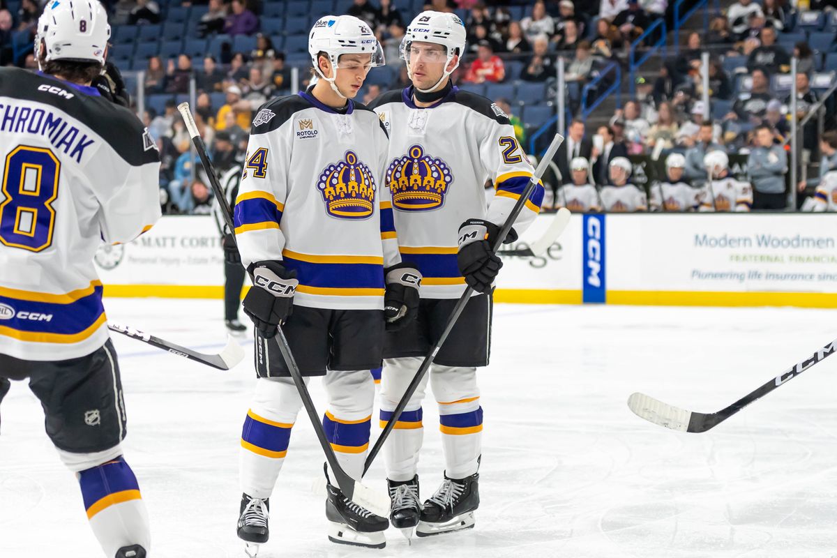 Ontario Reign defender Angus Booth (24) and center Lane Pederson (29)during a stop in play during an AHL game against the Calgary Wranglers, Tuesday, Oct. 20, 2026, in Ontario, California. Ontario Reign defender Angus Booth (24) and center Lane Pederson (29)during a stop in play during an AHL game against the Calgary Wranglers, Tuesday, Oct. 20, 2026, in Ontario, California.