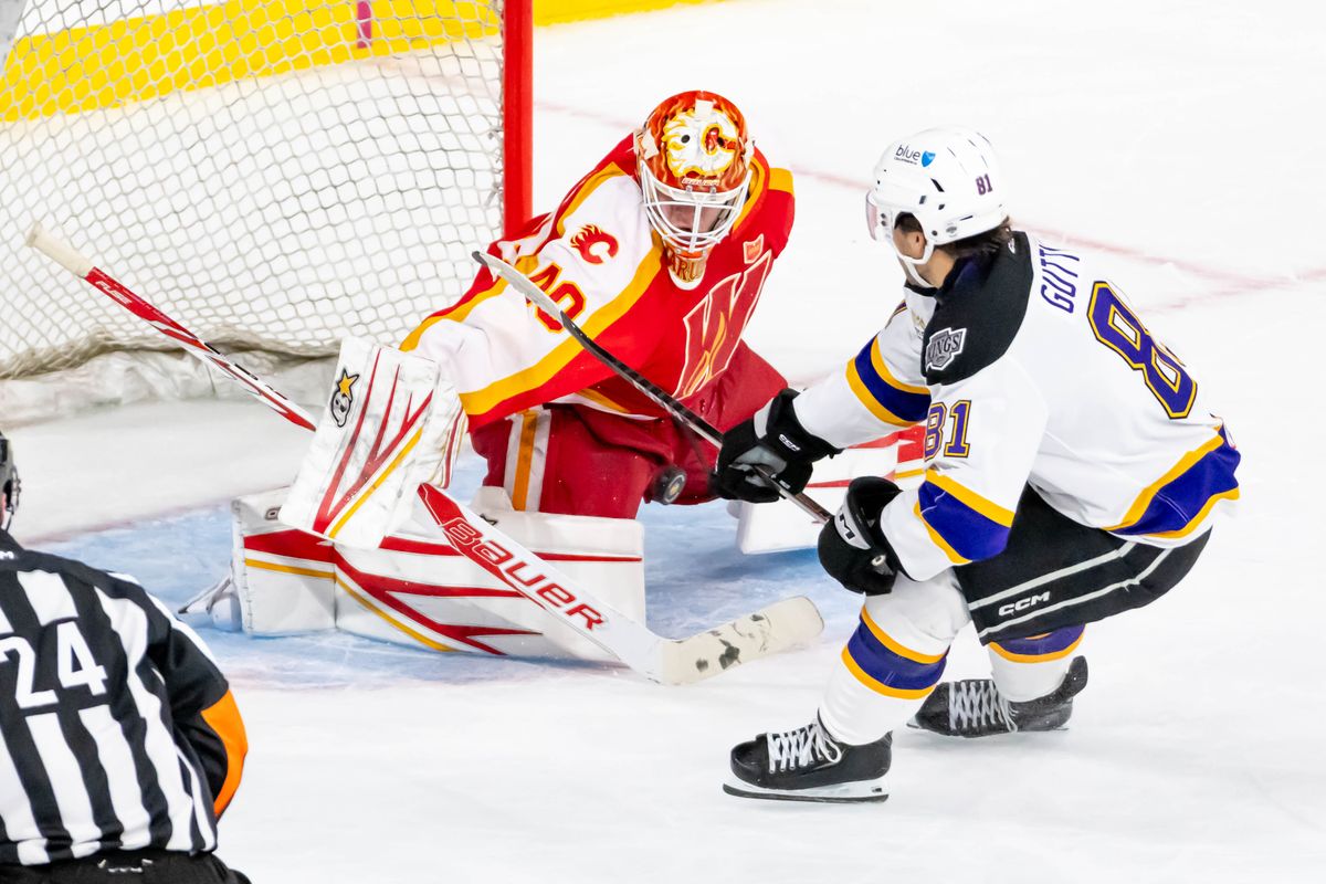 Ontario Reign forward Cole Guttman (81) attempts to score a goal during an AHL game against the Calgary Wranglers, Tuesday, Oct. 20, 2026, in Ontario, California. Ontario Reign forward Cole Guttman (81) attempts to score a goal during an AHL game against the Calgary Wranglers, Tuesday, Oct. 20, 2026, in Ontario, California.