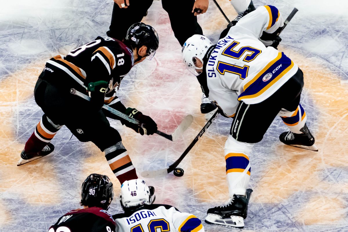 Ontario Reign center Grant Slukynsky (15) takes a face off during an AHL game against the Tucson Roadrunners, Friday, Oct. 30, 2026, in Ontario, California. Ontario Reign center Grant Slukynsky (15) takes a face off during an AHL game against the Tucson Roadrunners, Friday, Oct. 30, 2026, in Ontario, California.