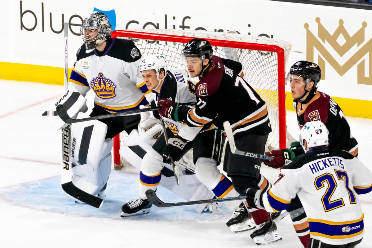 Ontario Reign defender Angus Booth (24) fights for position during an AHL game on Friday, Oct. 30, 2026, in Ontario, California. Ontario Reign defender Angus Booth (24) fights for position during an AHL game on Friday, Oct. 30, 2026, in Ontario, California.