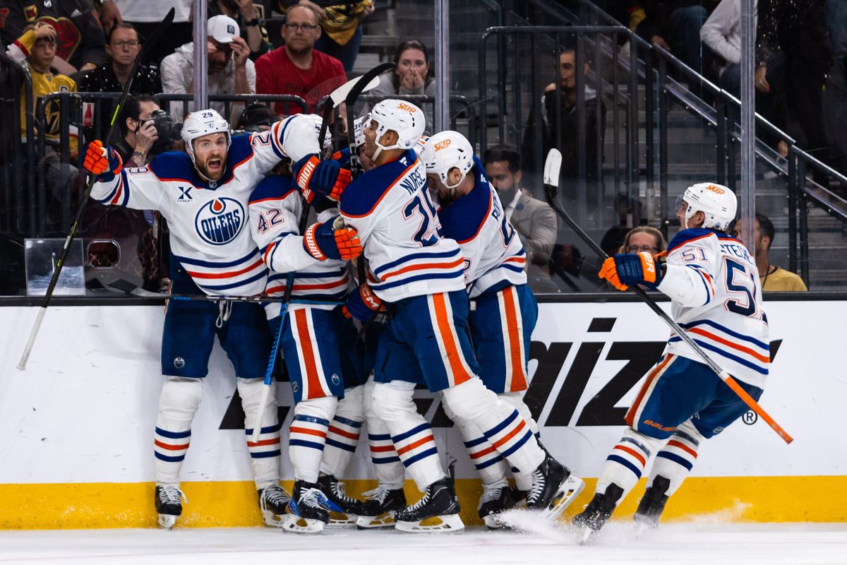 Edmonton Oilers celebrate after an overtime goal during a NHL playoff game between the Las Vegas Golden Knights and the Edmonton Oilers, Wednesday May 14, 2025 in Las Vegas, Nev.