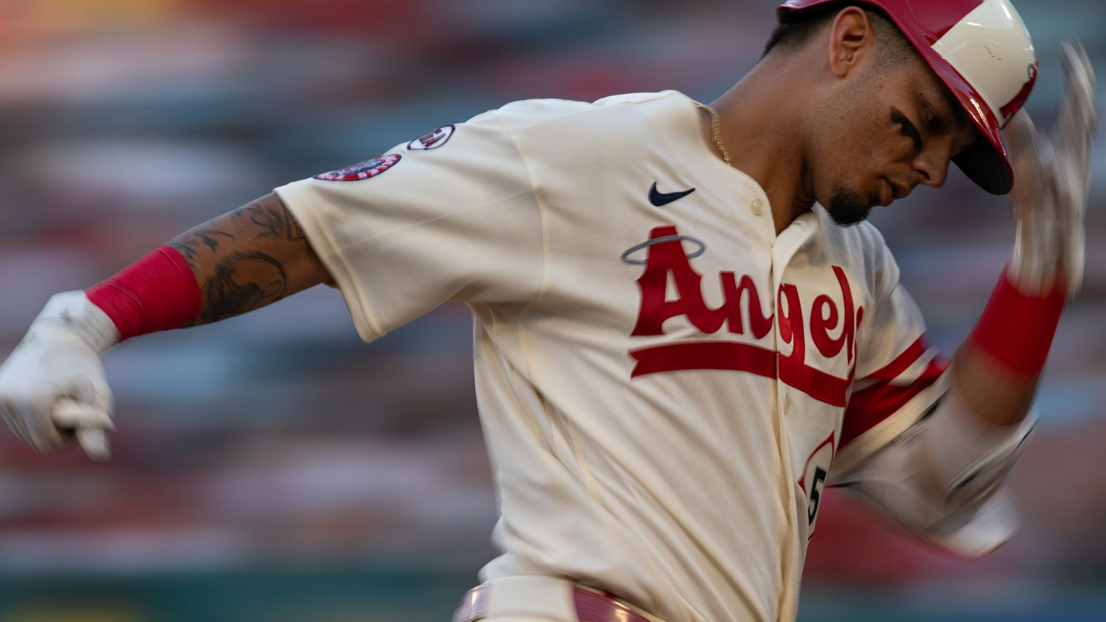 Los Angeles Angels second baseman Vaughn Grissom (5) runs past third base after hitting a homerun during an MLB game between the Houston Astros and Los Angeles Angels at Angel Stadium in Anaheim, California