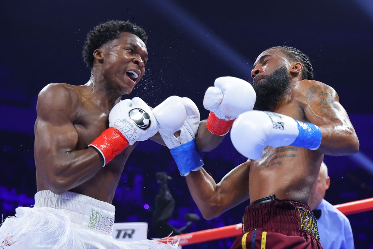Abdullah Mason connects with a left hand on Albert Bell as the fight begins to turn in his favor. Abdullah Mason connects with a left hand on Albert Bell as the fight begins to turn in his favor.