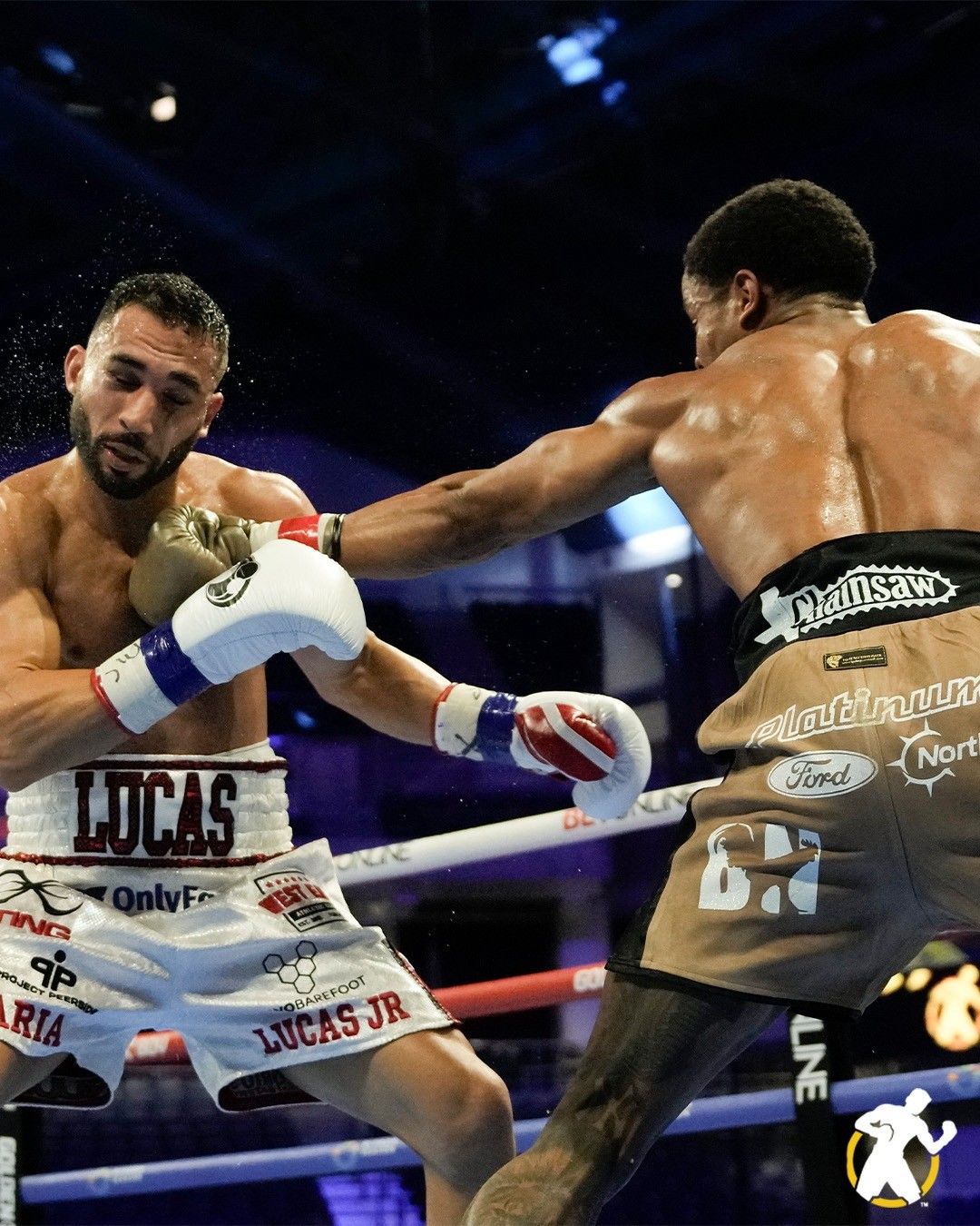 Floyd Schofield Jr. lands a left hand to the body of Lucas Bhadi during their WBA Lightweight title fight on Saturday night in Chicago. Floyd Schofield Jr. lands a left hand to the body of Lucas Bhadi during their WBA Lightweight title fight on Saturday night in Chicago.
