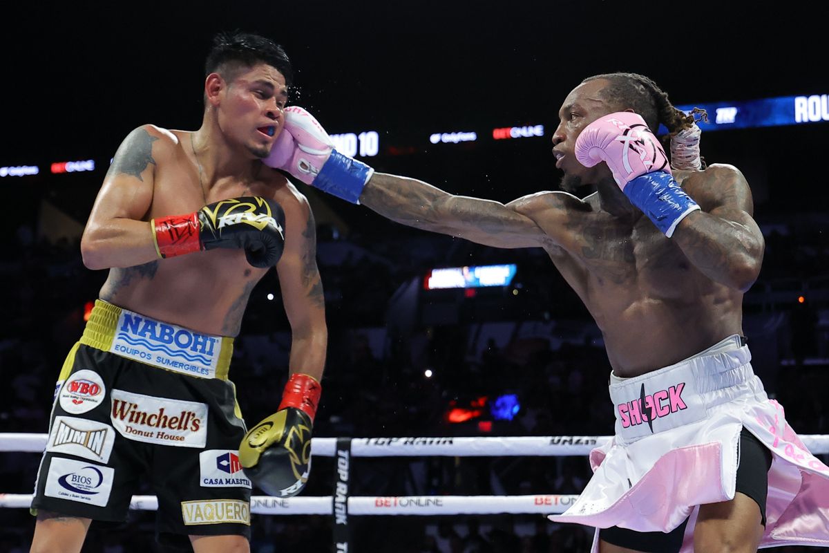 O'Shaquie Foster throws a straight right hand that lands on the chin of Emanuel Navarrete. O'Shaquie Foster throws a straight right hand that lands on the chin of Emanuel Navarrete.