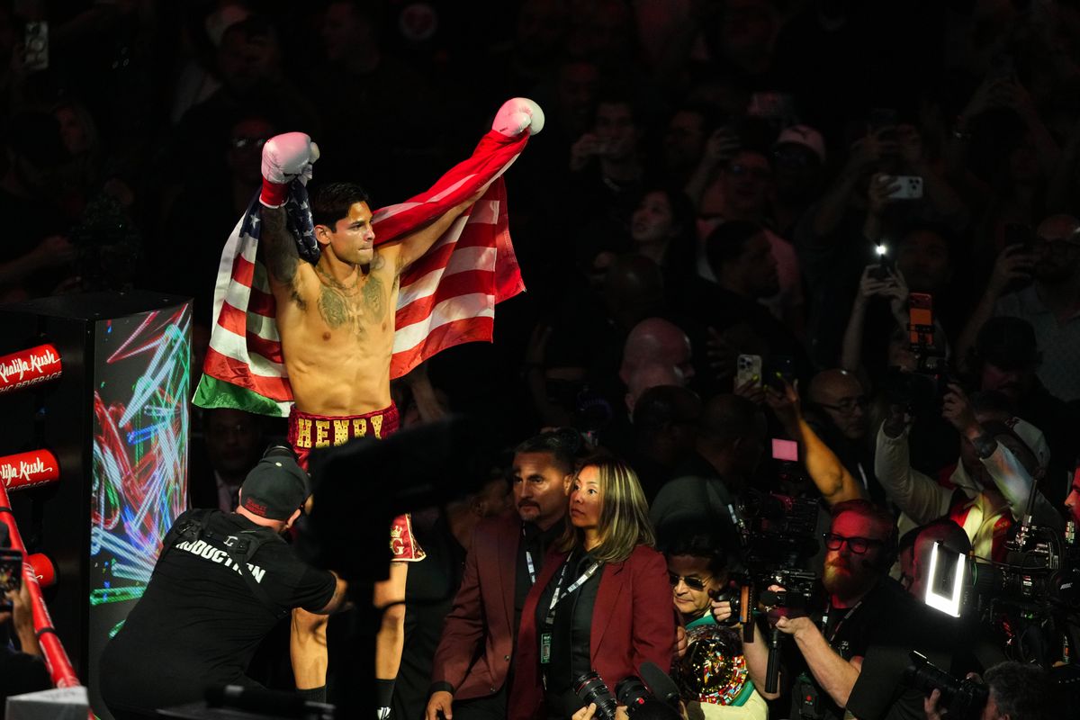 Ryan Garcia raises the American and Mexican flags after his second-round TKO win over Conor Benn Saturday night at T-Mobile Arena. Ryan Garcia raises the American and Mexican flags after his second-round TKO win over Conor Benn Saturday night at T-Mobile Arena.
