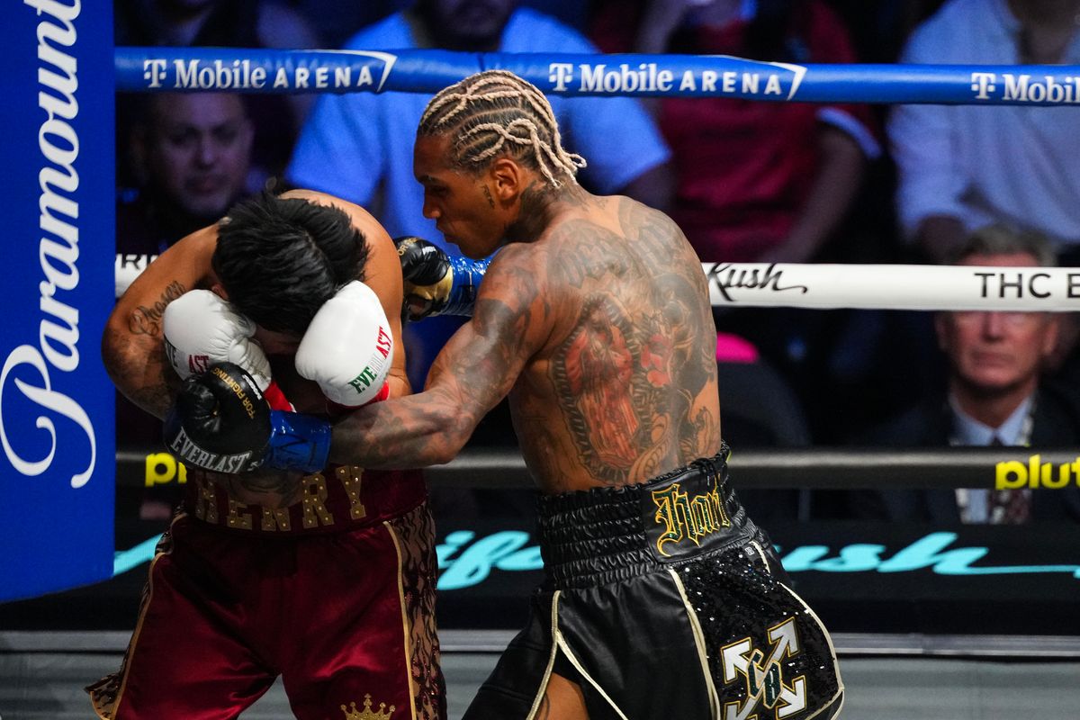 Conor Benn lands a left hand to the body on Ryan Garcia during their WBC welterweight title fight Saturday at T-Mobile Arena. Conor Benn lands a left hand to the body on Ryan Garcia during their WBC welterweight title fight Saturday at T-Mobile Arena.