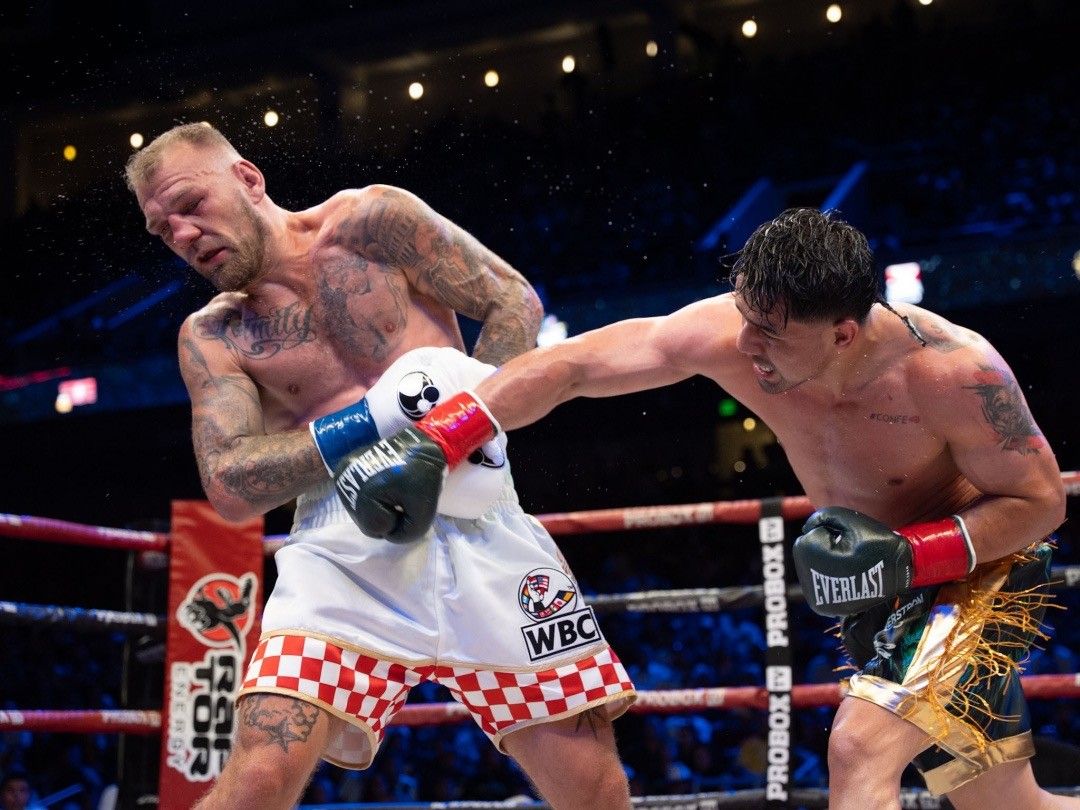 Martinez lands a right hand on Plantic during their WBC interim title fight Saturday at the Galen Center.