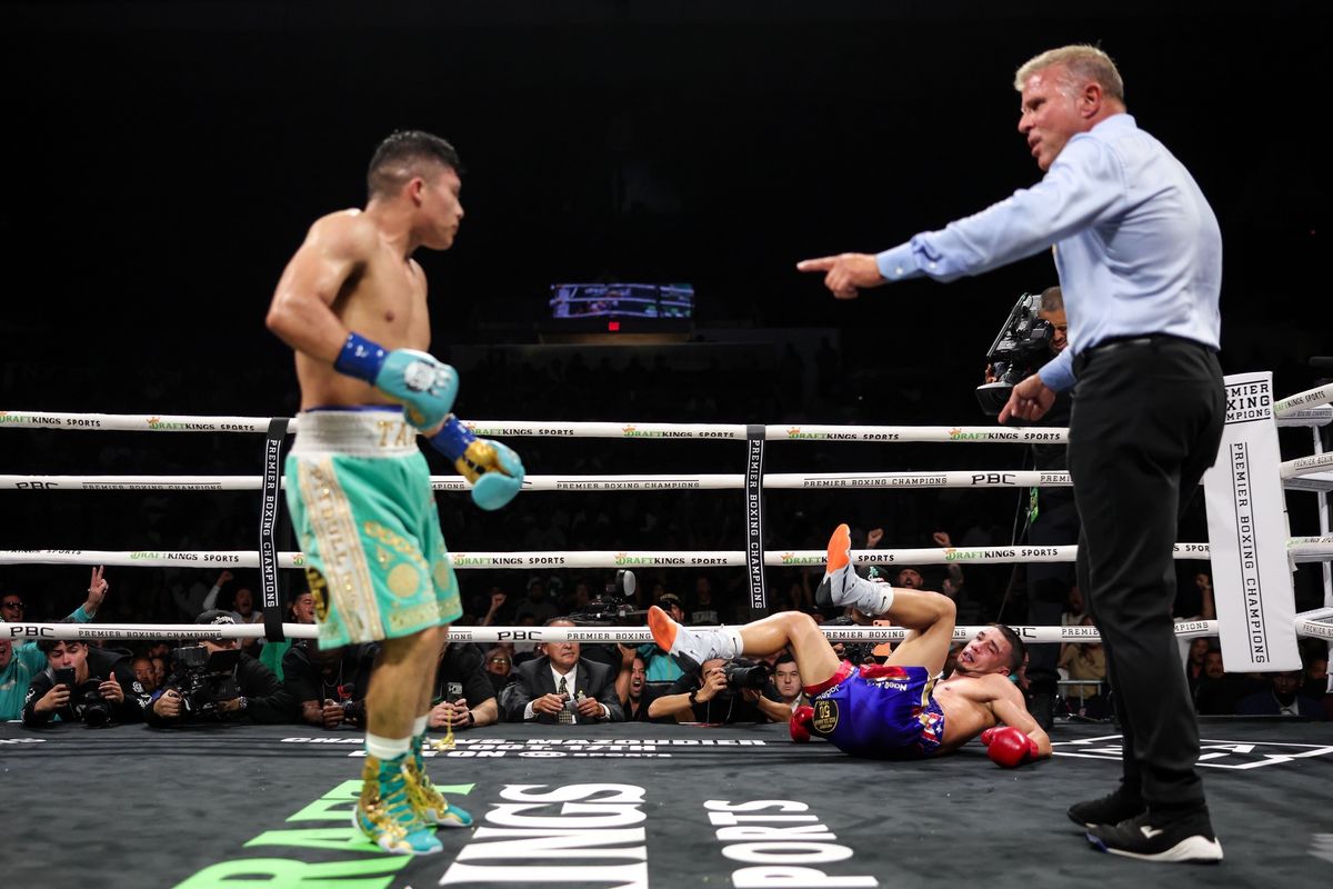 Nestor Bravo hits the canvas as referee Thomas Taylor begins his count. Taylor waved off the fight at 1:30 of round six. Nestor Bravo hits the canvas as referee Thomas Taylor begins his count. Taylor waved off the fight at 1:30 of round six.