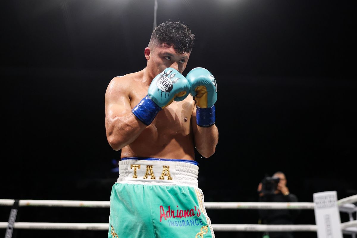 Cruz stays composed behind his guard during the fight. Cruz stays composed behind his guard during the fight.