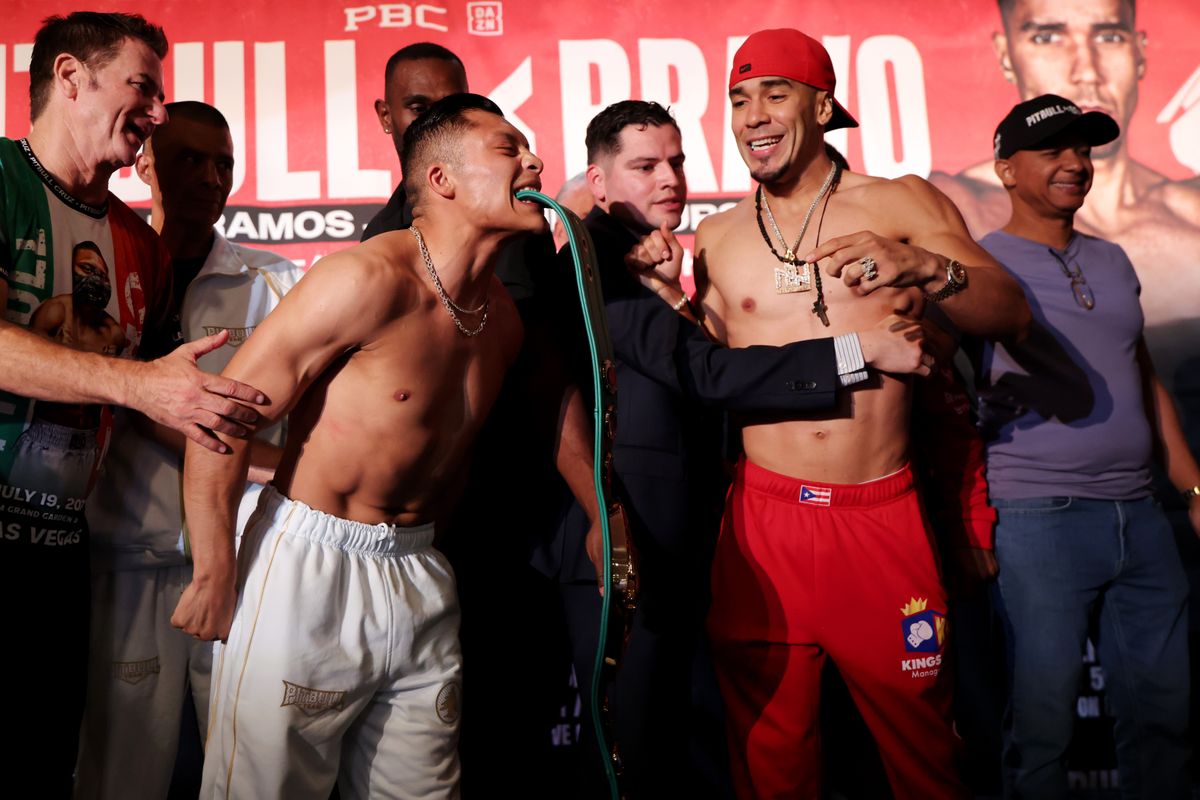 Cruz refusing to let Bravo touch his title at Friday's weigh-in Cruz refusing to let Bravo touch his title at Friday's weigh-in