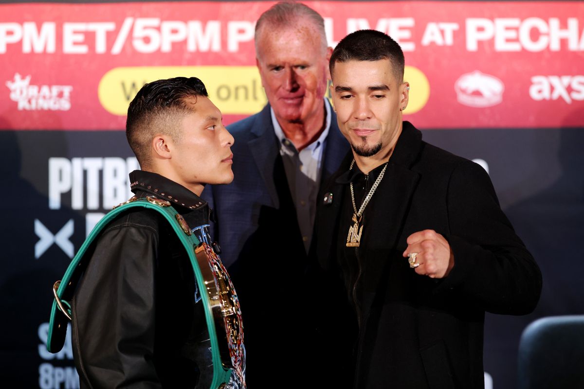 Isaac 'Pitbull' Cruz sizes Nestor Bravo up at Thursday's final press conference. Isaac 'Pitbull' Cruz sizes Nestor Bravo up at Thursday's final press conference.