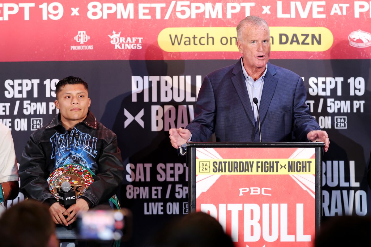 TGB Promotions president Tom Brown addresses the media at Thursday's final press conference, with Isaac 'Pitbull' Cruz looking on. TGB Promotions president Tom Brown addresses the media at Thursday's final press conference, with Isaac 'Pitbull' Cruz looking on.