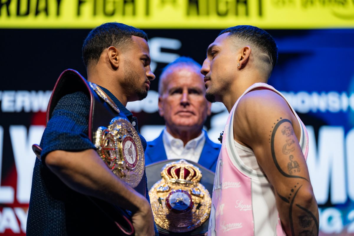Rolly Romero (left) and Teofimo Lopez face off during Thursday's press conference announcing their August 22 WBA welterweight world championship fight at T-Mobile Arena in Las Vegas.