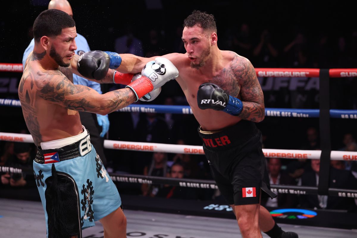 Steven Butler lands a right hook on Edgar Berlanga that temporarily stuns him and pushes him back Steven Butler lands a right hook on Edgar Berlanga that temporarily stuns him and pushes him back