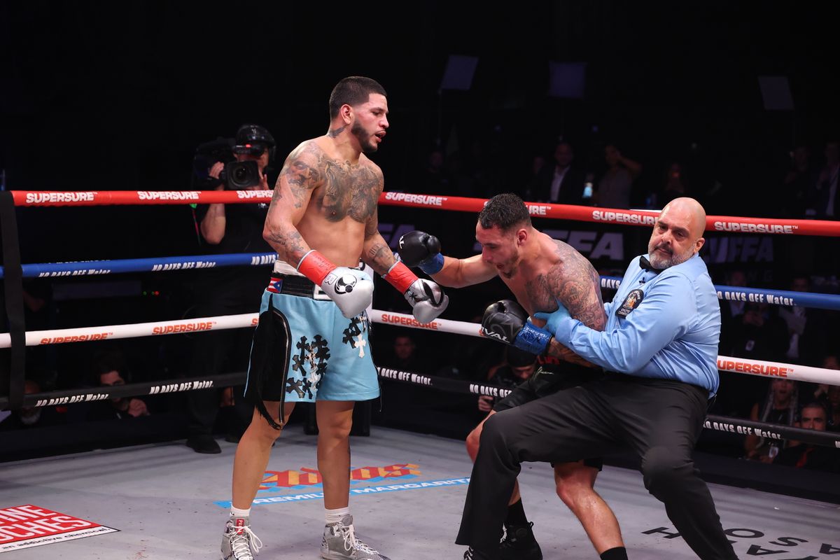 The referee had seen enough and dove in to stop the fight and save Steven Butler from any further punishment in the seventh round against Edgar Berlanga The referee had seen enough and dove in to stop the fight and save Steven Butler from any further punishment in the seventh round against Edgar Berlanga