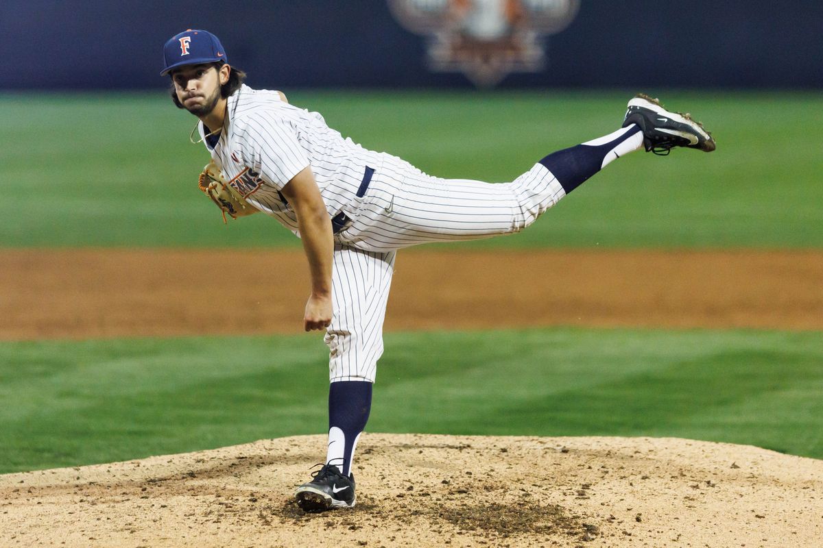 CSUF Titans pitcher Mikiah Negrete (4) pitches during an NCAA Baseball game against the CBU Lancers on February 13, 2026 in Fullerton, California.