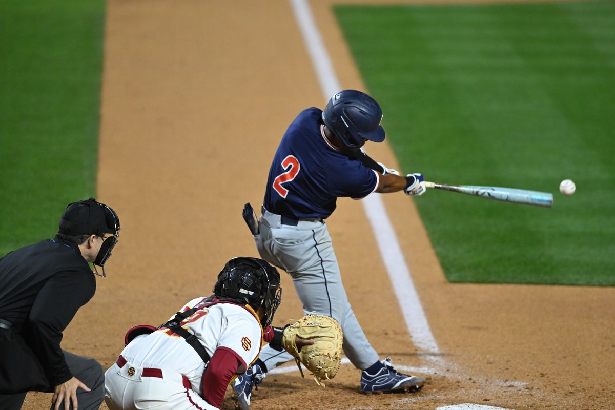Pepperdine Wave infielder Kai Laxa (2) swings during an NCAA Men's baseball game between the USC Trojans and Pepperdine Wave Friday February 13,2026 at Dedeaux Field in Los Angeles Calif