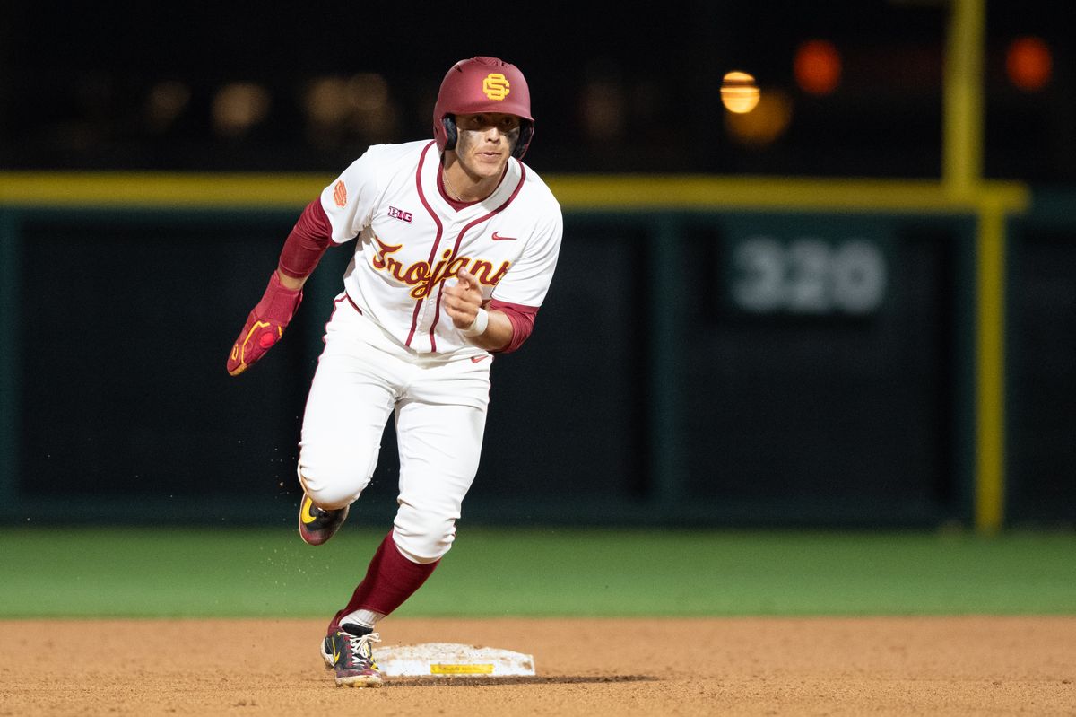 USC Trojan outfielder Kevin Takeuchi (8) sprints to third base during an NCAA Men's baseball game between the USC Trojans and Pepperdine Wave Friday February 13,2026 at Dedeaux Field in Los Angeles Calif