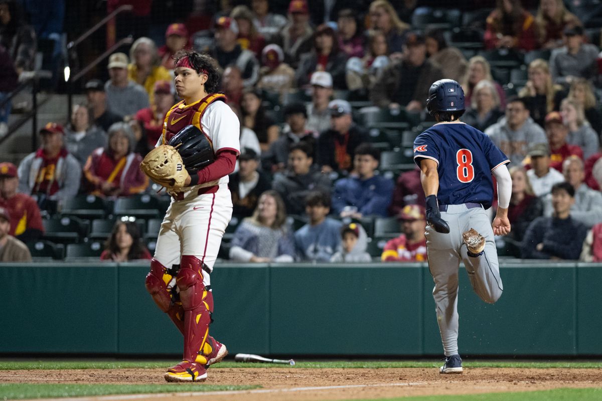 Pepperdine Wave infielder Daniel Patterson (8) scores during an NCAA Men's baseball game between the USC Trojans and Pepperdine Wave Friday February 13,2026 at Dedeaux Field in Los Angeles Calif