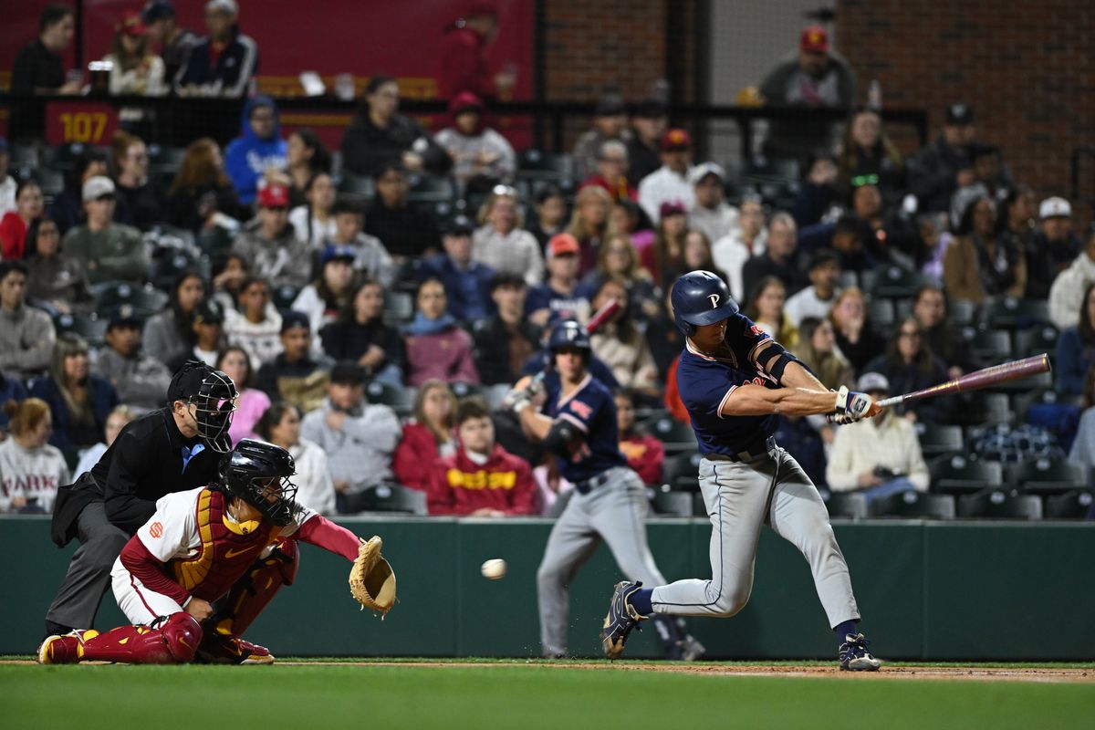 Pepperdine Wave outfielder Trey Dunn (5) swings a strike during an NCAA Men's baseball game between the USC Trojans and Pepperdine Wave Friday February 13,2026 at Dedeaux Field in Los Angeles Calif