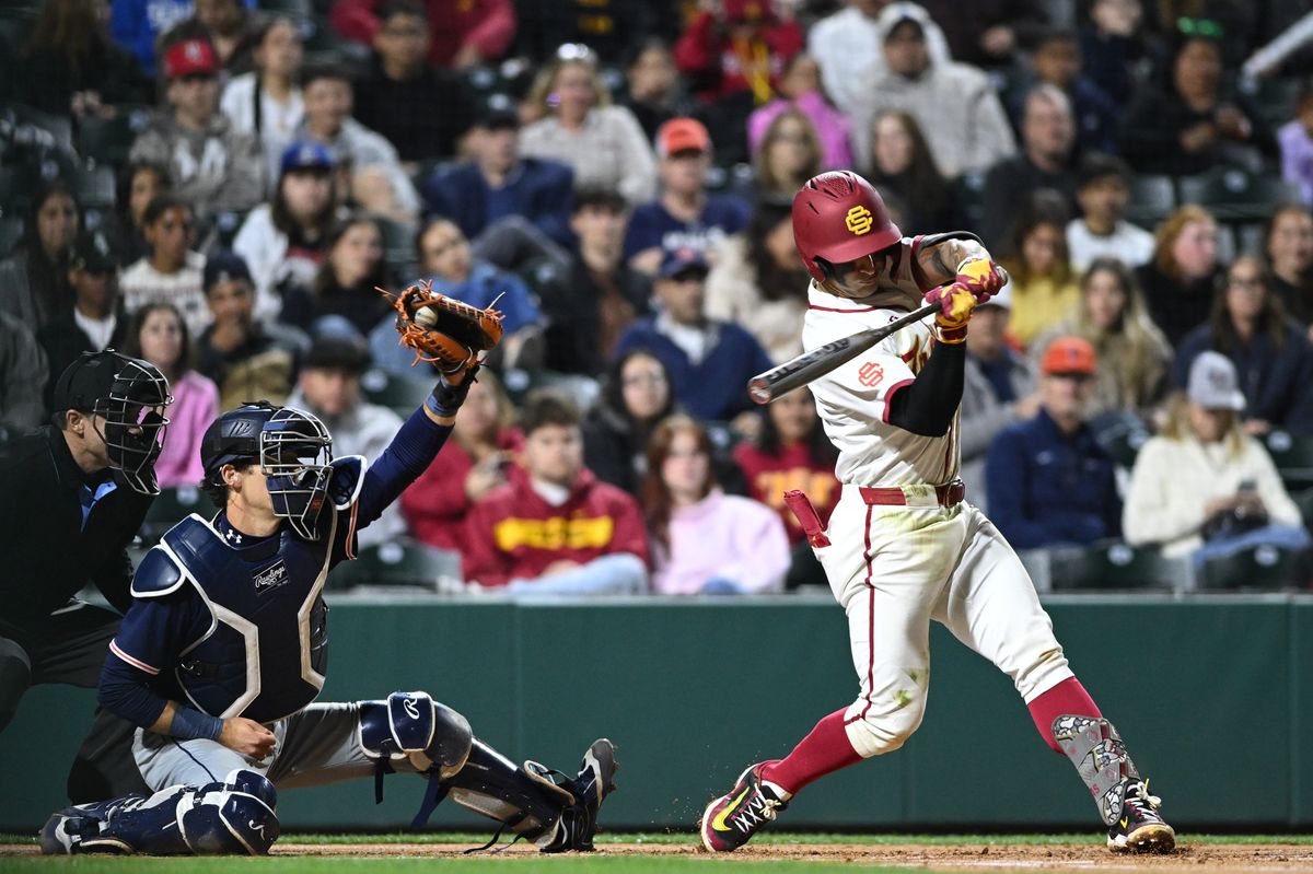 USC Trojan infielder Abbrie Covarrubias (7) swings and misses the ball during an NCAA Men's baseball game between the USC Trojans and Pepperdine Wave Friday February 13,2026 at Dedeaux Field in Los Angeles Calif