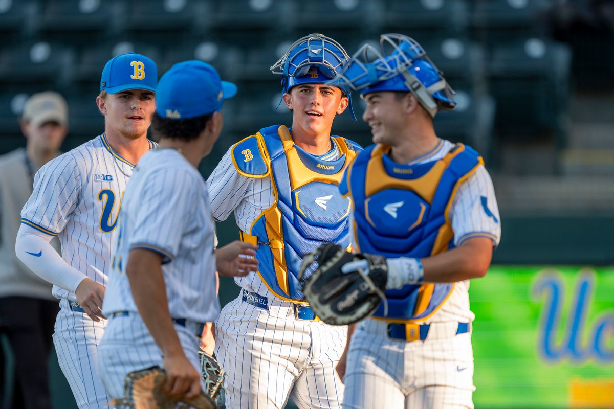 UCLA catcher, Cashel Dugger (40) warming up during a NCAA baseball game against UC San Diego on February 13, 2026 at Jackie Robinson Stadium in Los Angeles, CA.
