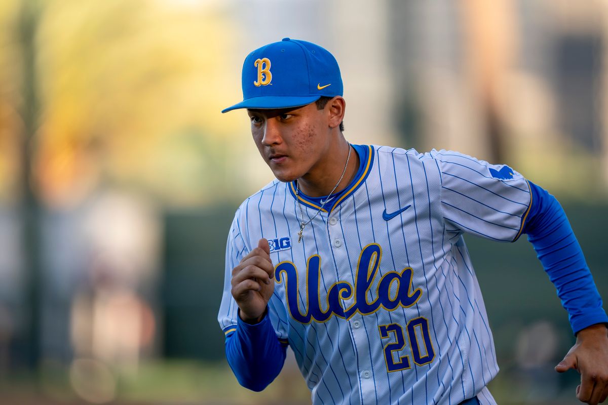 UCLA pitcher, Justin Lee (20) warming up before a NCAA baseball game against UC San Diego on February 13, 2026 at Jackie Robinson Stadium in Los Angeles, CA.