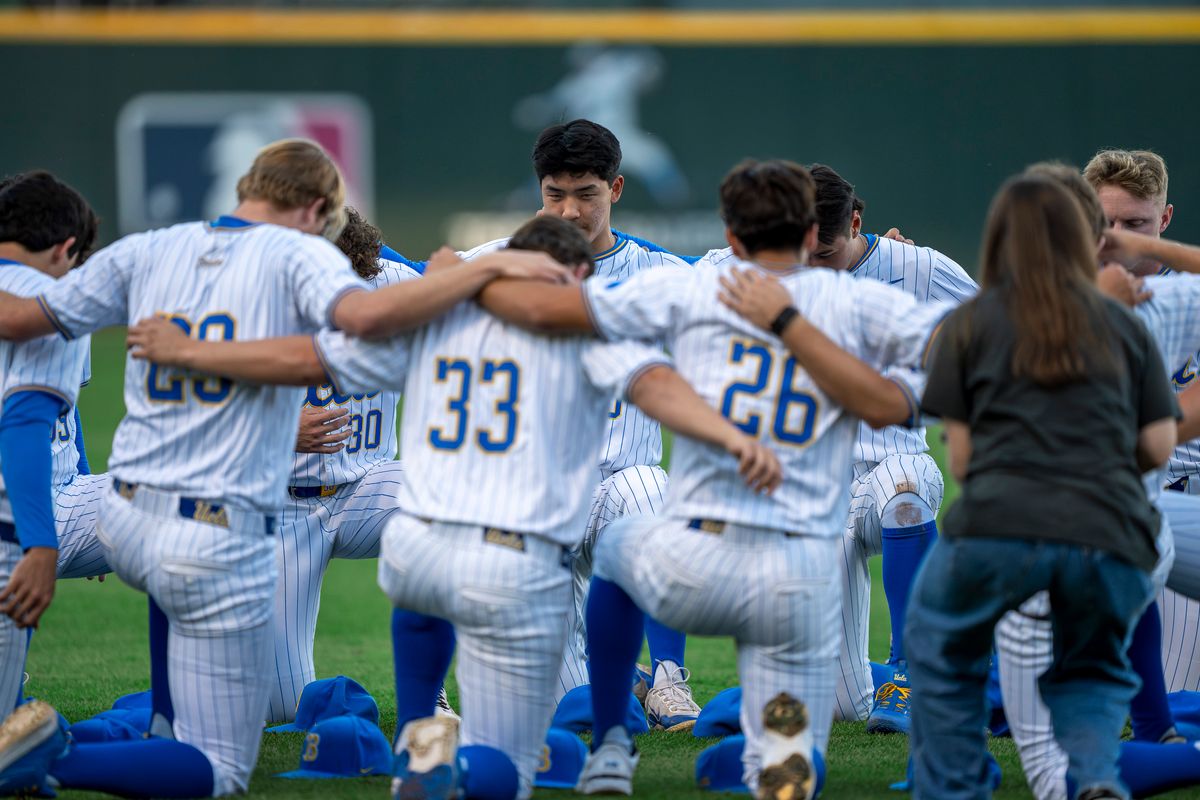 UCLA Bruins baseball team huddling up before a NCAA baseball game against UC San Diego on February 13, 2026 at Jackie Robinson Stadium in Los Angeles, CA.